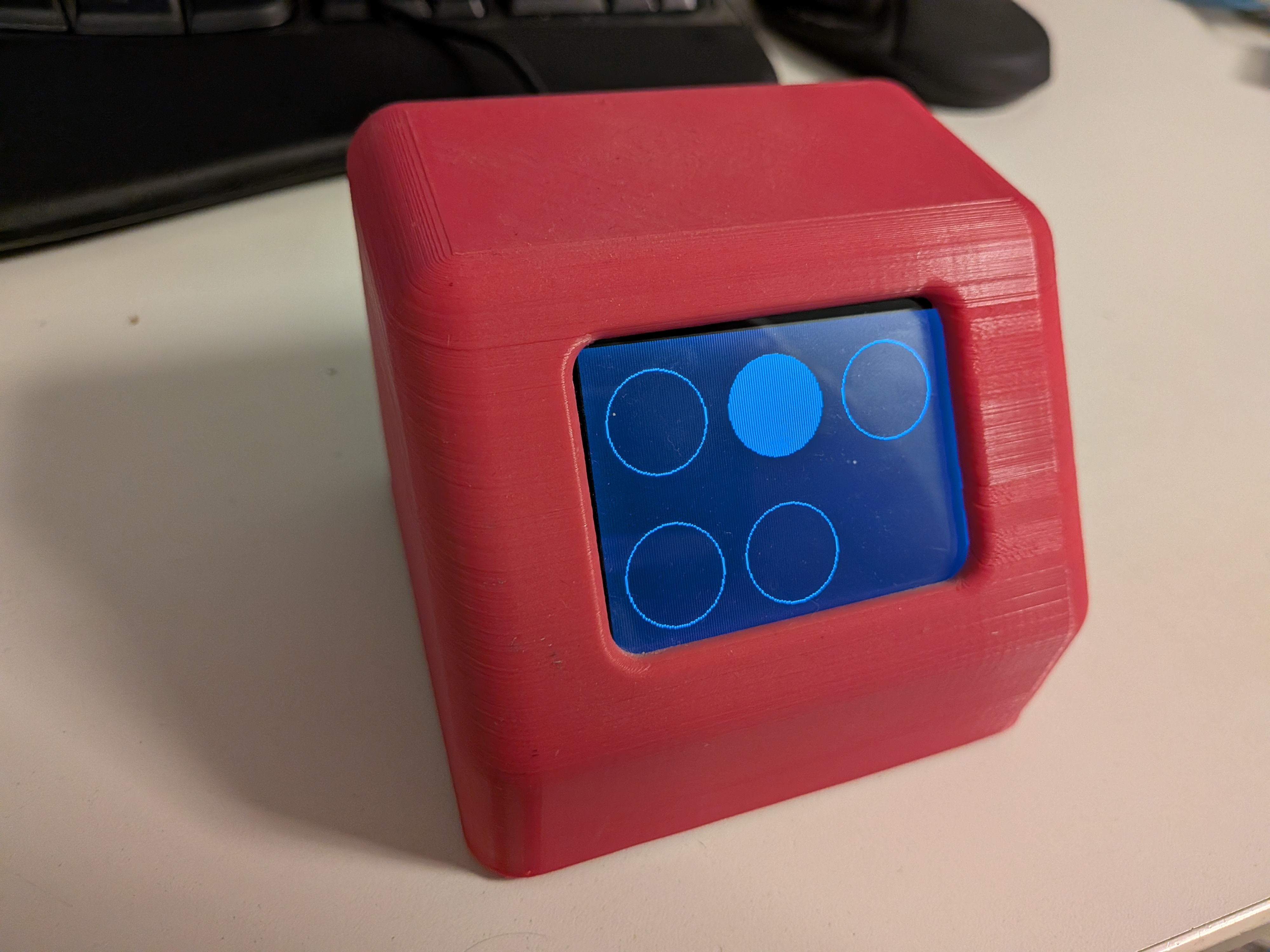 The device in its 3D-printed case